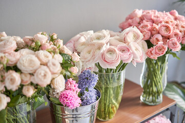 Many different flowers on Showcase. Background of mix of flowers. Beautiful flowers for catalog or online store. Floral shop and delivery concept.