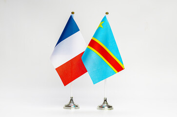 National flags of France and DR Congo on a light background.