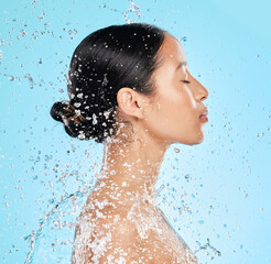 Beauty, water and face profile of woman on blue background for wellness, healthy skin and cleaning....