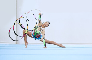 Gymnastics woman, ribbon and floor in portrait, competition or sport for fitness, performance or...