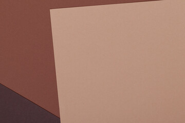 Multicolor background from a paper of different shades of brown. Geometric backdrop.