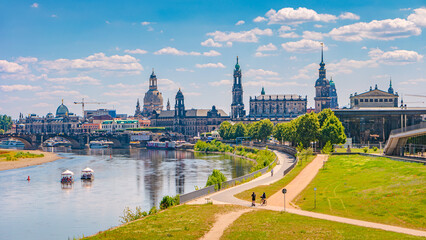 Dresden, Germany. Panoramic over old city historical downtown, Elbe river and party boats with...