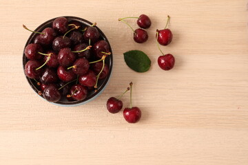 cherries on a wooden table