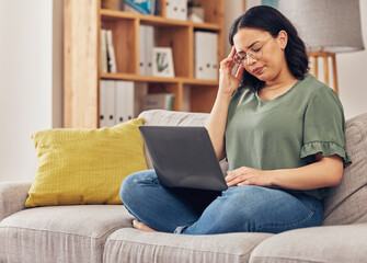 Remote work from home, laptop and woman with a headache, fatigue and overworked with health issue. Female person, freelancer or girl on a couch with migraine, burnout or exhausted with pain or stress