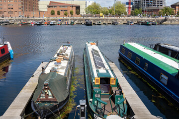 Liverpool, united kingdom May, 16, 2023  Beautiful boat houses anchored in the Liverpool city harbor