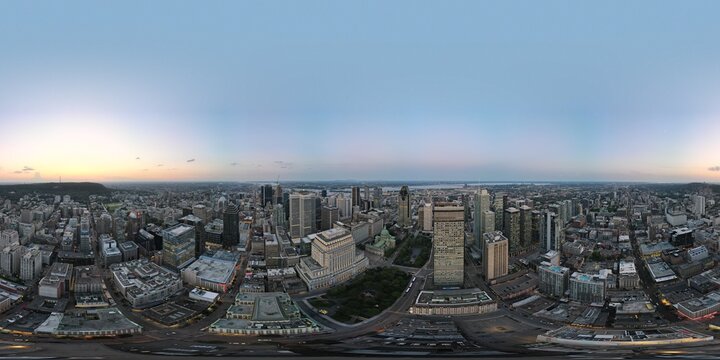 360 Aerial Photo Taken With Drone Of Sun Life Building, Dorchester Square, Place Du Canada And The Montreal Skyline Just Before Sunset