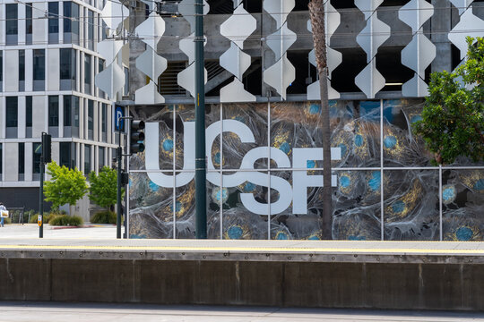 Close up of UCSF (University of California San Francisco) sign on the garage building in San Francisco, California, USA - June 6, 2023. UCSF is a public institution that was founded in 1864.