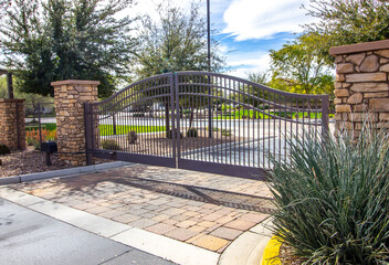 Wrought Iron Security Gate With Rock Columns