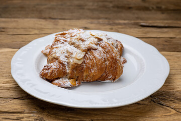 Delicious flavored pastries on a wooden table.  Close up