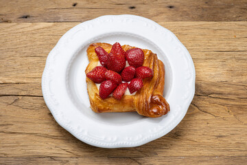 Delicious flavored pastries on a wooden table.  Close up