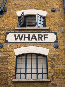 London, UK, July 9th 2023: Shuters Wharf building sign. Is a Grade II listed building in Southwark, London, England. Warehouse, converted to flats. At Dockhead Wharf, 2 Shad Thames, London SE1 2YT.