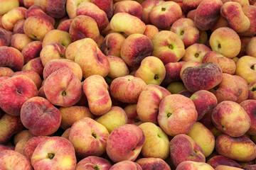 Showcase with fig peaches. Food market, close-up