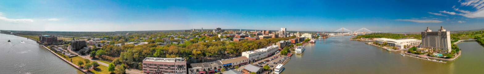 Panoramic aerial view of Savannah skyline and river from drone - Georgia - USA