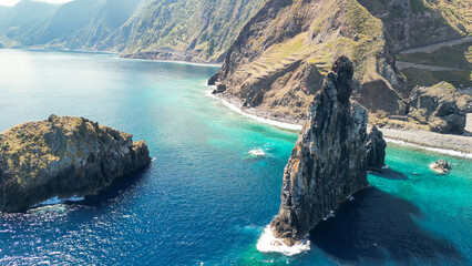 Aerial view of tall lava rocks in ocean, islet towers in Ribeira da Janela, Madeira, Portugal - obrazy, fototapety, plakaty