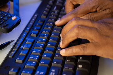 hands typing on a keyboard - technology