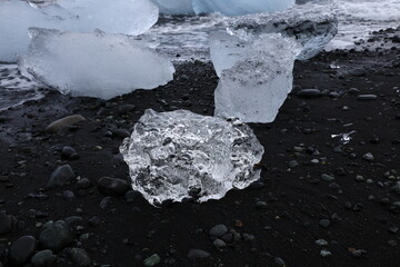 View of a block of ice on diamond beach located in south iceland