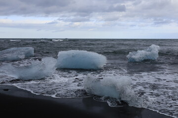 View of a block of ice on diamond beach located in south iceland