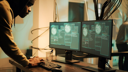 African american spy copying important data from hard disk, using drive to plant computer malware on multi monitors. Young adult hacking network system and security server, output source.