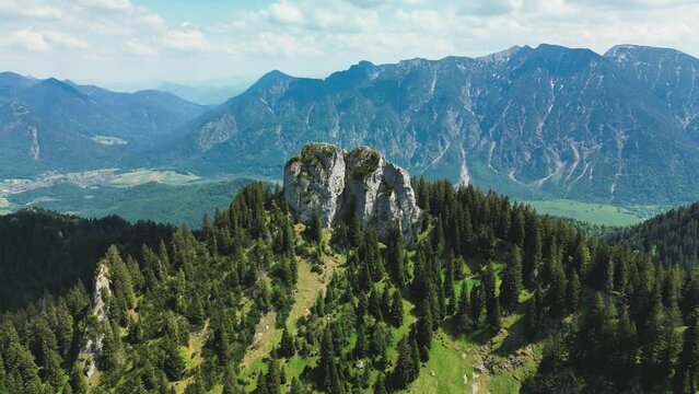 Aerial view of Ettaler Manndl, famous mountain of the Ammergau Alps in Bavaria, Germany. It is close to the town of Oberammergau, above of Ettal.