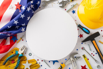 Honoring construction workers on Labor Day: top-view photograph exhibiting flag, helmet, gloves,...