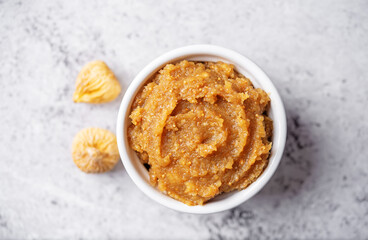 Dried Figs fruits puree on a background