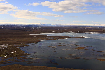 Mývatn is a shallow lake located in an area of active volcanism in northern Iceland, near the Krafla volcano