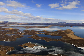 Mývatn is a shallow lake located in an area of active volcanism in northern Iceland, near the Krafla volcano
