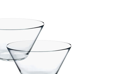 Two transparent glass bowls isolated on white copy-space background.