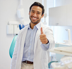 Portrait, man and dentist with thumbs up, smile and oral care with happiness, specialist and...
