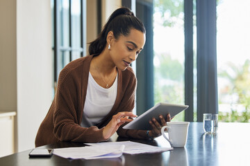 Technology, woman with tablet and documents paying her bills online at her home. Payment or banking, budget or internet connectivity and female person with paper on kitchen counter of her house