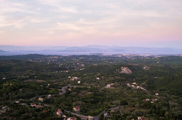 Fototapeta na wymiar Amazing mountainous view to Corfu from Pelekas village in the dusk