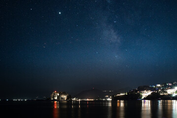 Starry night over Pontikonisi island in Corfu, Greece