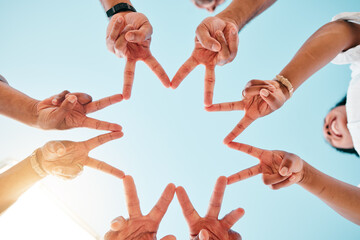 Star, hands and business people with peace sign on sky background for teamwork, solidarity or...