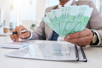 Businessman, money and documents with calculator for accounting, budget planning or finance on office desk. Closeup of man or accountant hands with cash for savings, audit or salary at the workplace