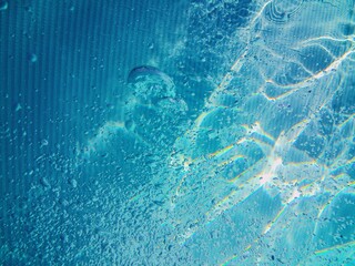 Blue pool water bubbles background texture