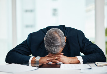 Burnout, professional and senior man sleeping at desk with tech or problem with fatigue in office. Tired, stress and senior male person asleep on table with insomnia at workplace at workplace. - Powered by Adobe