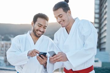 Happy, karate and men with phone in the city for martial arts, app information or social media....