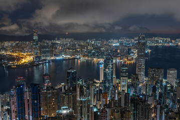 Midnight scenery of Victoria Harbor of Hong Kong city