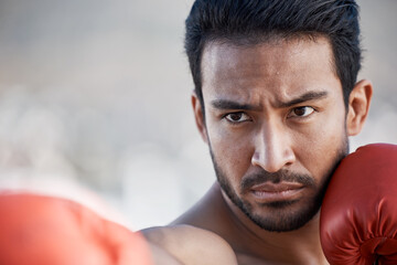 Fitness, man boxing or face of boxer in training, exercise and punching with strong power in...