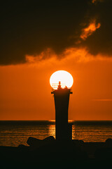 灯台と朝日