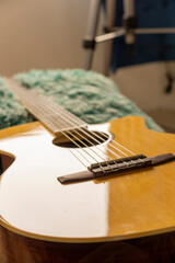 Fototapeta premium wooden electroacoustic guitar with nylon strings