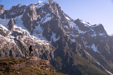 Hiker in front of mountains