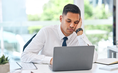 Bored, tired and business man at laptop in office with stress, anxiety or burnout for tax audit. Lazy, sad and frustrated employee working at computer with challenge, problem or fatigue of boring job