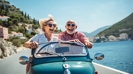 Fotobehang Ein glückliches Ehepaar auf einem Motorroller am Mittelmeer im Urlaub © NHDesign