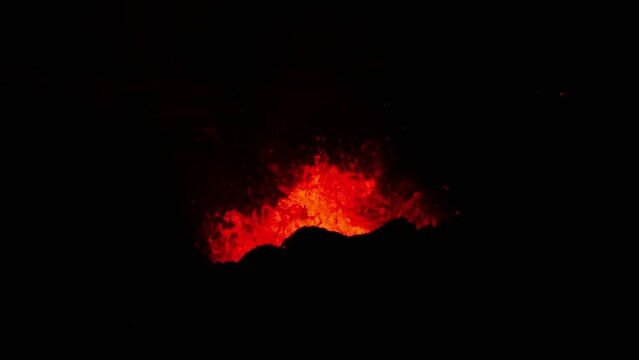 Splashing hot red molten magma from active volcano, Litli Hrutur