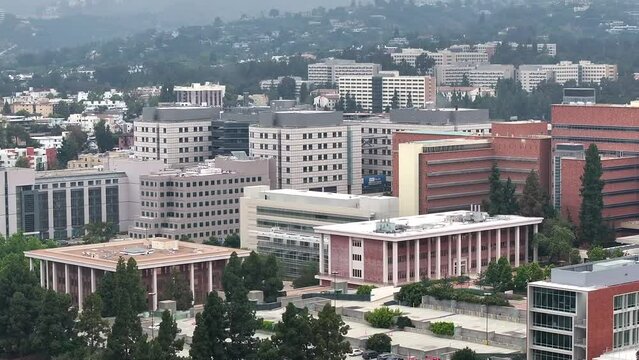Aerial View of UCLA Medical Center Buildings, University of California Campus, Los Angeles USA, Establishing Drone Shot