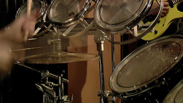 Drummer Playing Drum Kit at Sound Recording Studio. Close Up. 