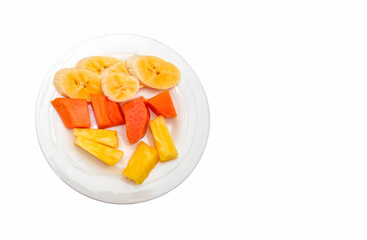 Chopped fruit plate for breakfast - Pineapple, banana and papaya