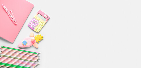 Rocket made of plasticine and stationery on light background with space for text