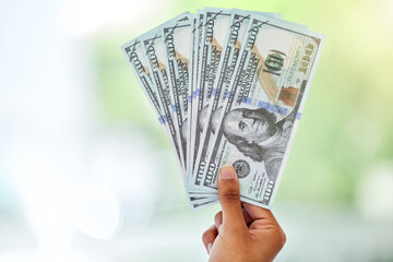 Cash in hand, dollars and money fan with finance, reward and prize with giveaway bonus and financial freedom. Bills, notes and person with wealth, payment and lotto with cashback and mockup space